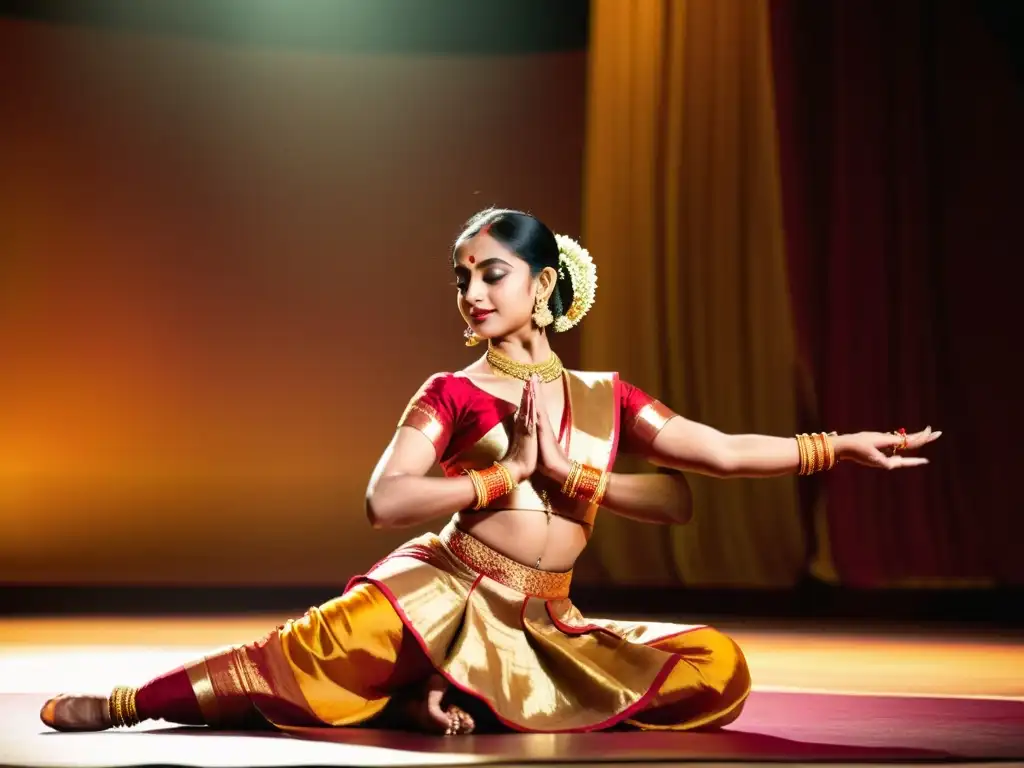 Una bailarina de Bharatanatyam deslumbra en el escenario con su gracia y expresión, vistiendo trajes tradicionales y joyas doradas