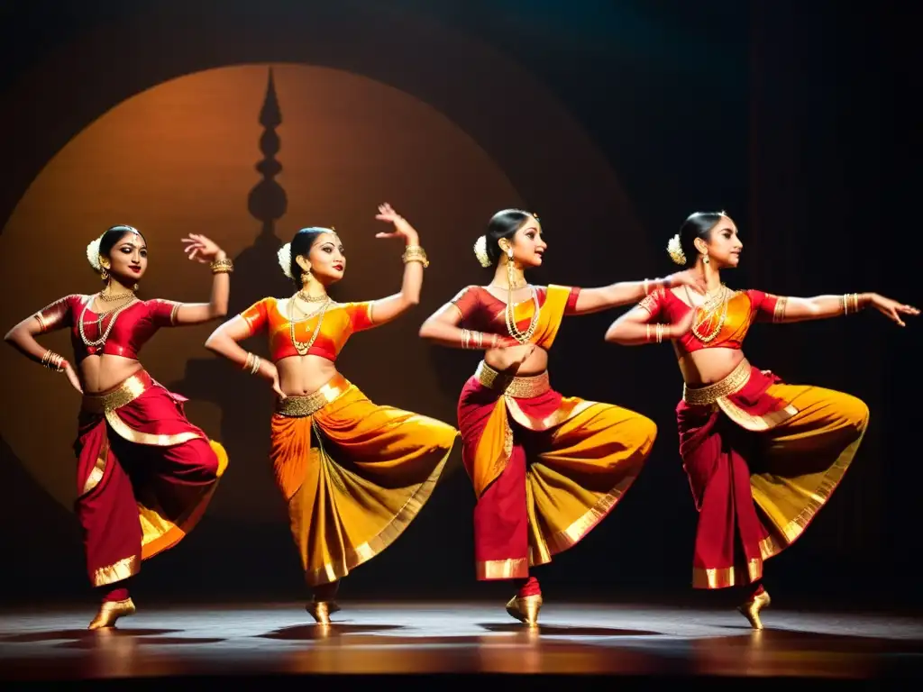 Un grupo de bailarines de Bharatanatyam en trajes tradicionales y maquillaje detallado realizando una danza sincronizada y expresiva en un escenario, con iluminación dramática que proyecta sombras y resalta sus movimientos