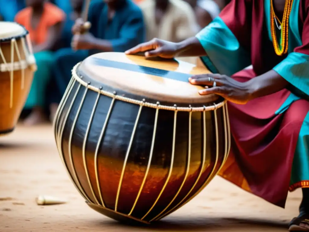 Un músico talentoso tocando un tambor de agua durante una danza tradicional de África Occidental, transmitiendo tradición y poder