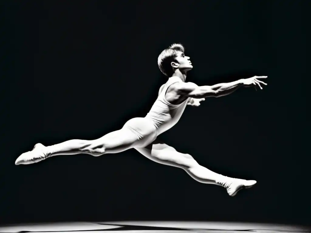 Rudolf Nureyev en potente salto, mostrando gracia y poder en el escenario